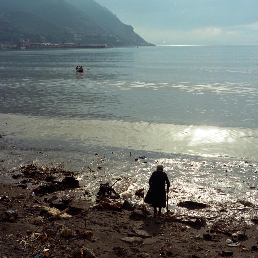napoli castellammare di stabia beach old lady italy italian garbage coast elderly age people