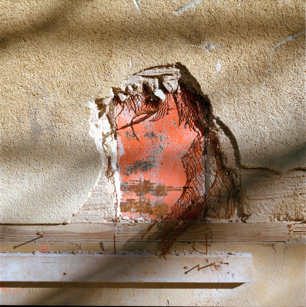 textures light shadows walls plaster stucco deconstruction cracking peeling brick tan black red orange white